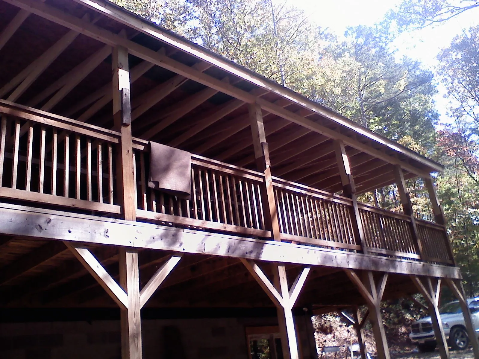 Timber framing under a new elevated porch and deck — Roof Leak Repair in Livingston by Roofing Brothers